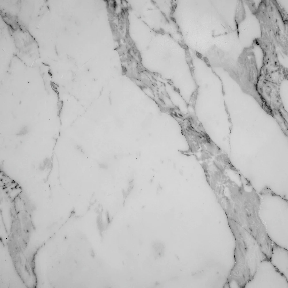 Detail: the marble, in black and white